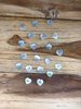20 Mother of Pearl small heart buttons