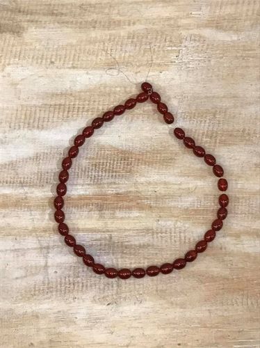 Red Agate short oval beads 10mmx7mm 40cms