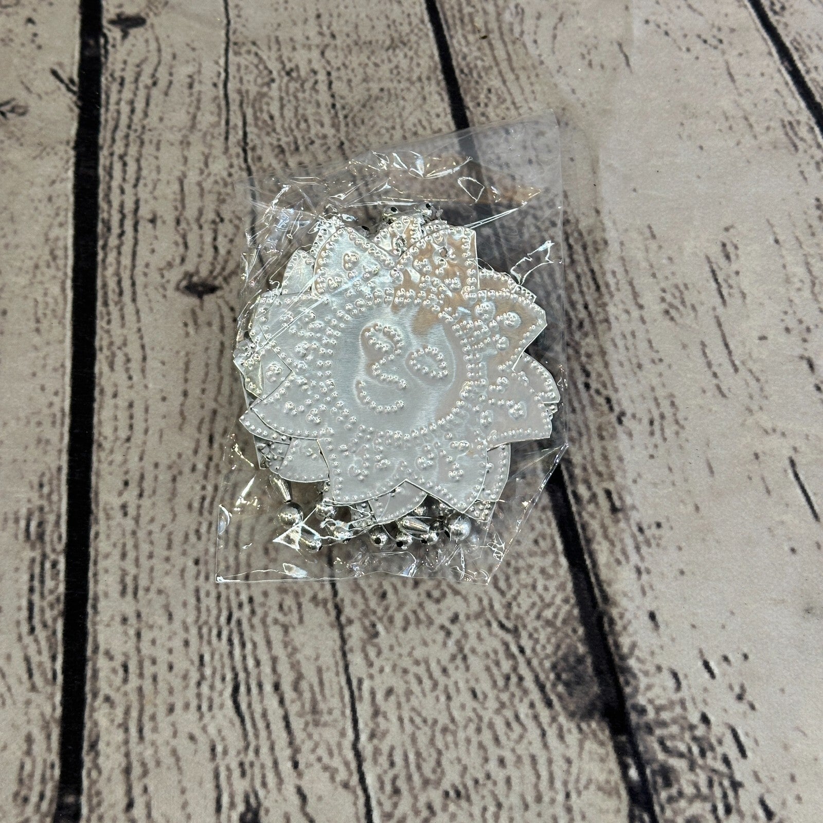 Aluminium Stamped Sitting Sun Face String Wall Hangings Home Decoration1