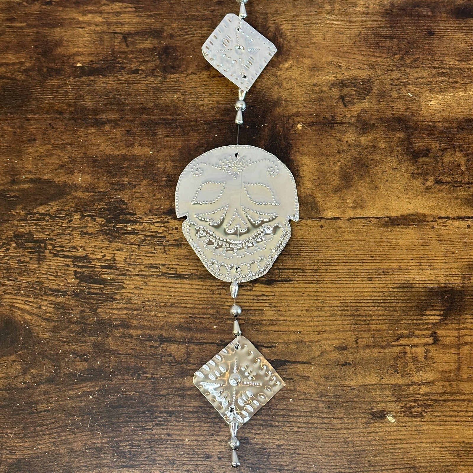 Aluminium Stamped Sitting Skull String Wall & Door Hangings for Home Decoration1