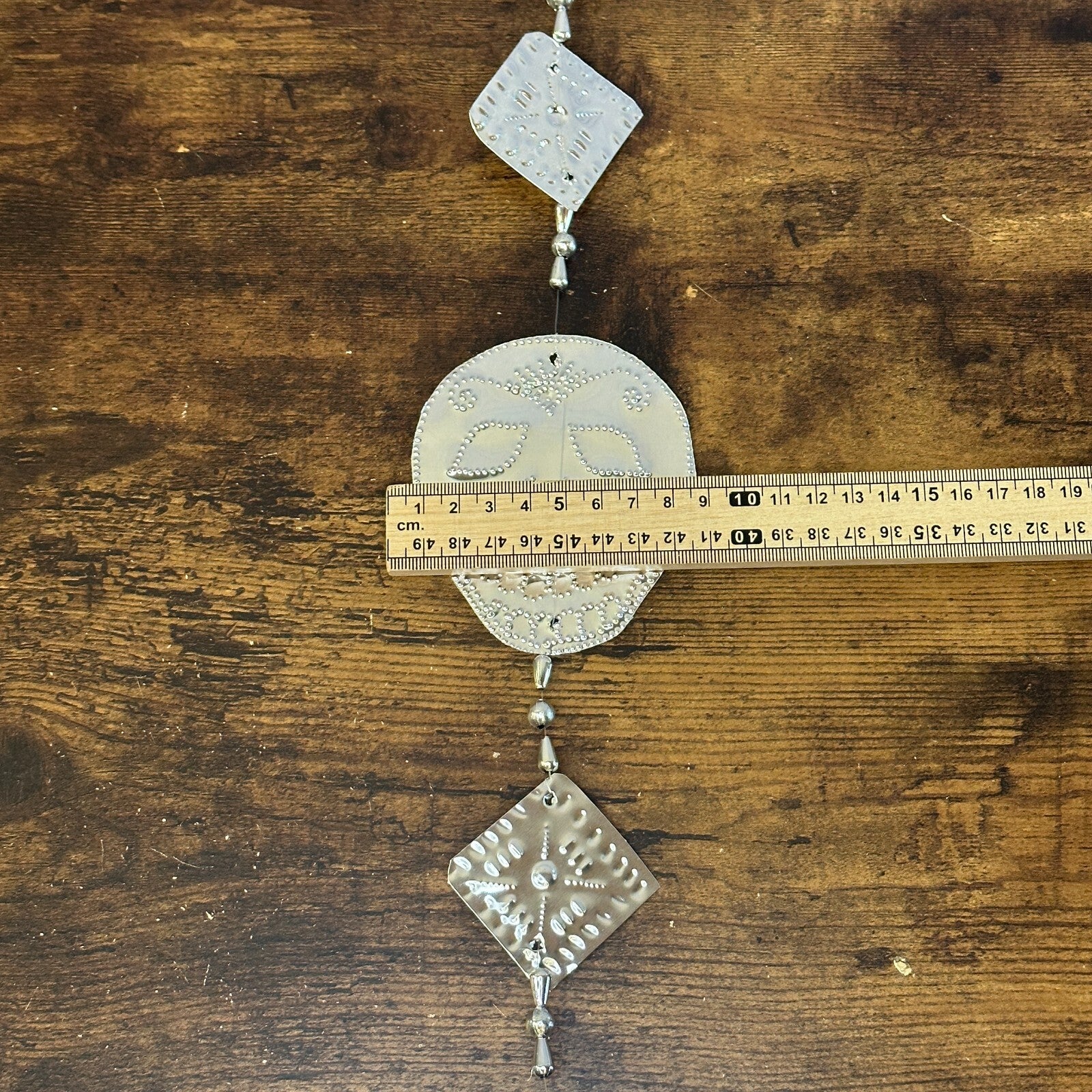 Aluminium Stamped Sitting Skull String Wall & Door Hangings for Home Decoration3