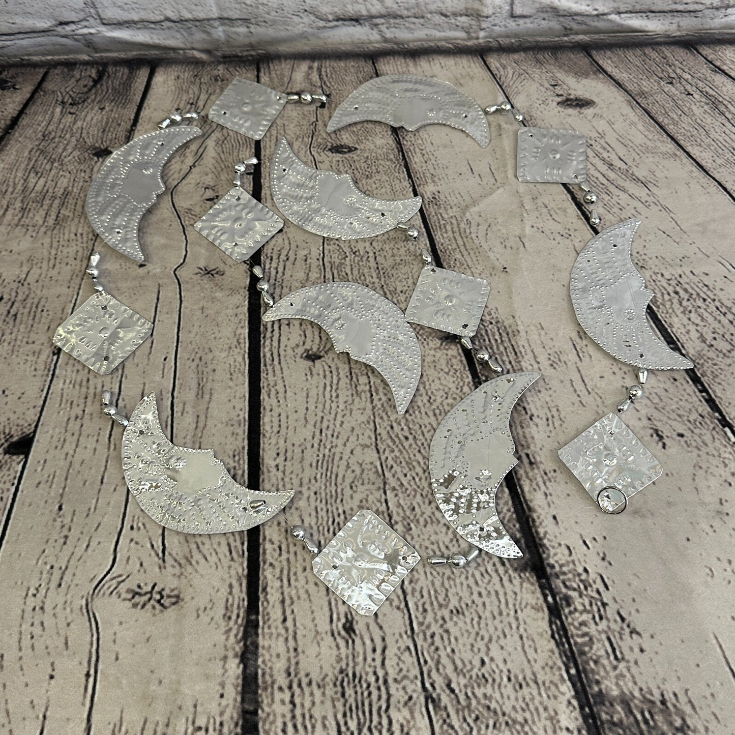 Aluminium Stamped Sitting Moon Face String Wall Hangings Home Decoration
