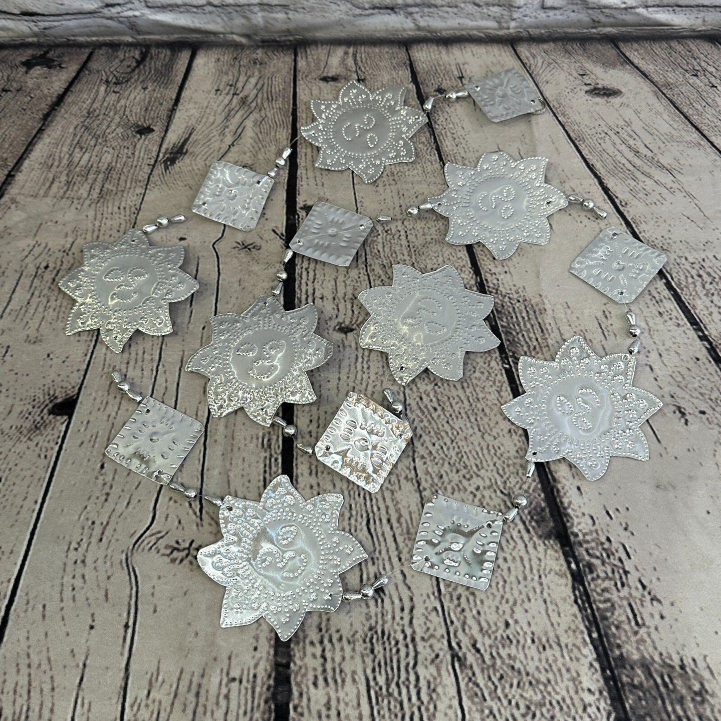 Aluminium Stamped Sitting Sun Face String Wall Hangings Home Decoration
