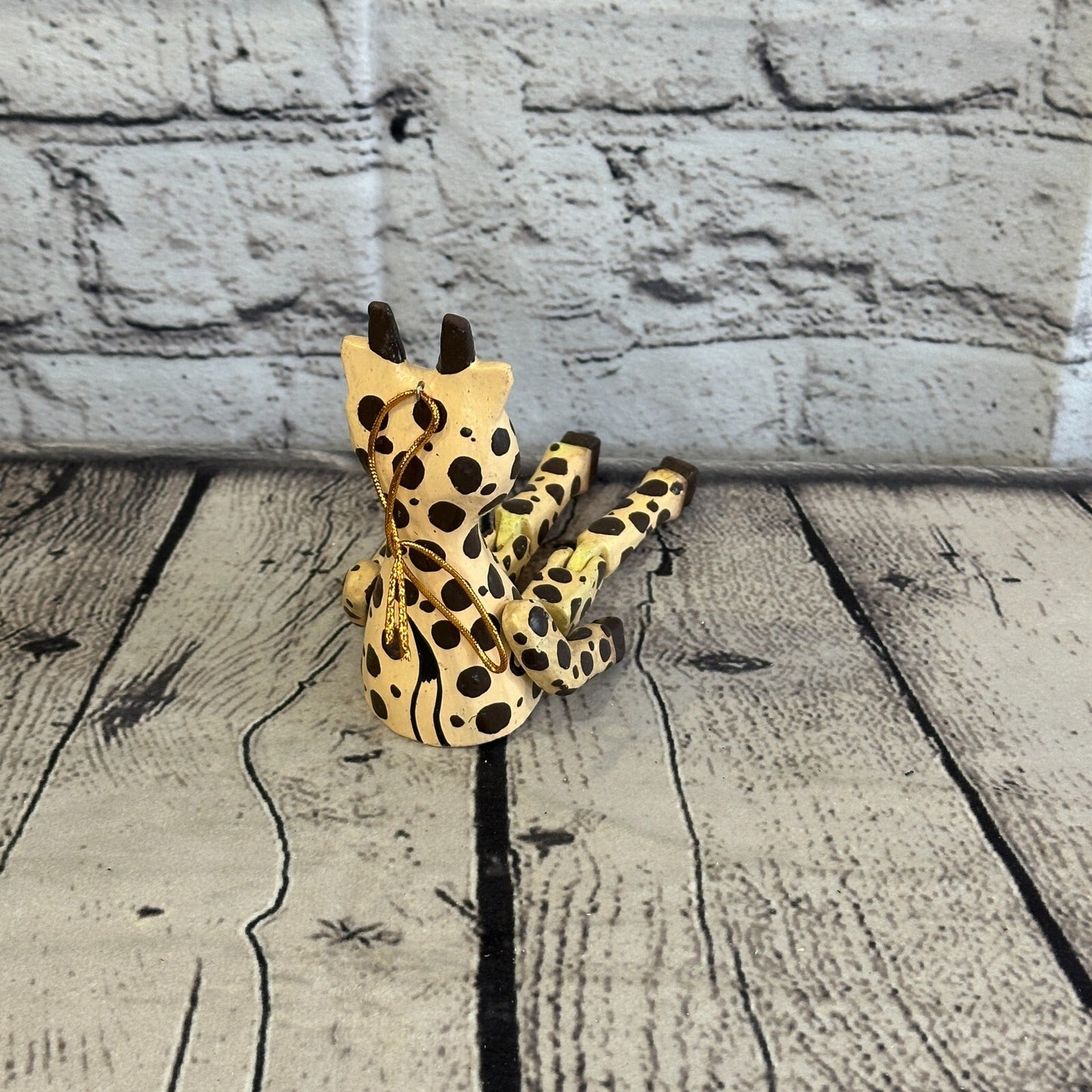 10cm Giraffe Sitting Animal, Wooden Shelf Ornament Handmade and Fairtrade